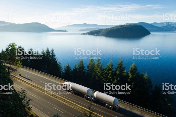 Transport truck driving along Highway 99, BC, Canada